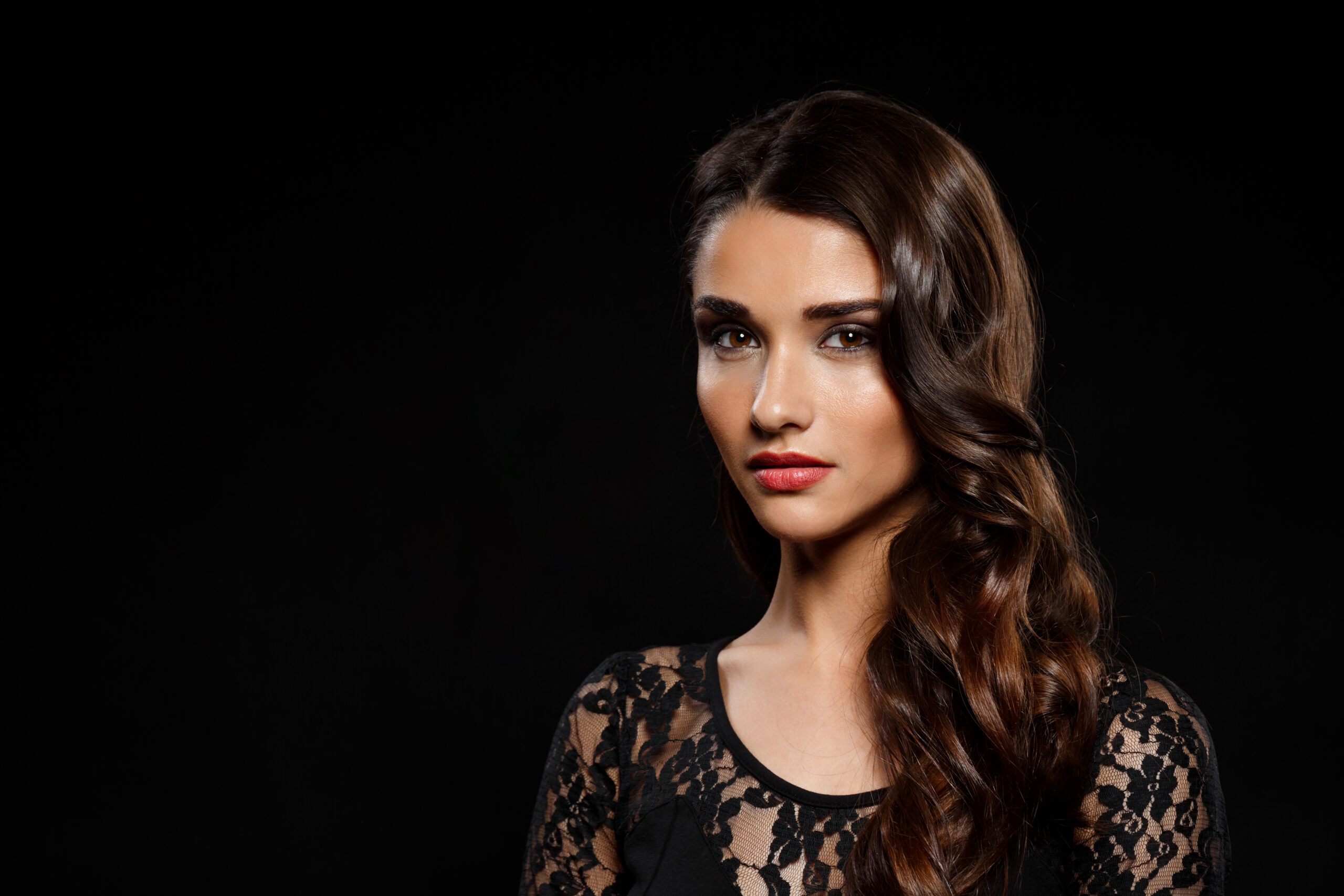 Portrait of beautiful girl in black dress over dark background 24 Inch Clip-in Streaks – Extra Long Color Highlights - Image 4